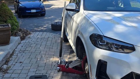 Sparky X premium mobile tire service in Whitby–Brooklin, Ontario — the service trailer at a customer's home